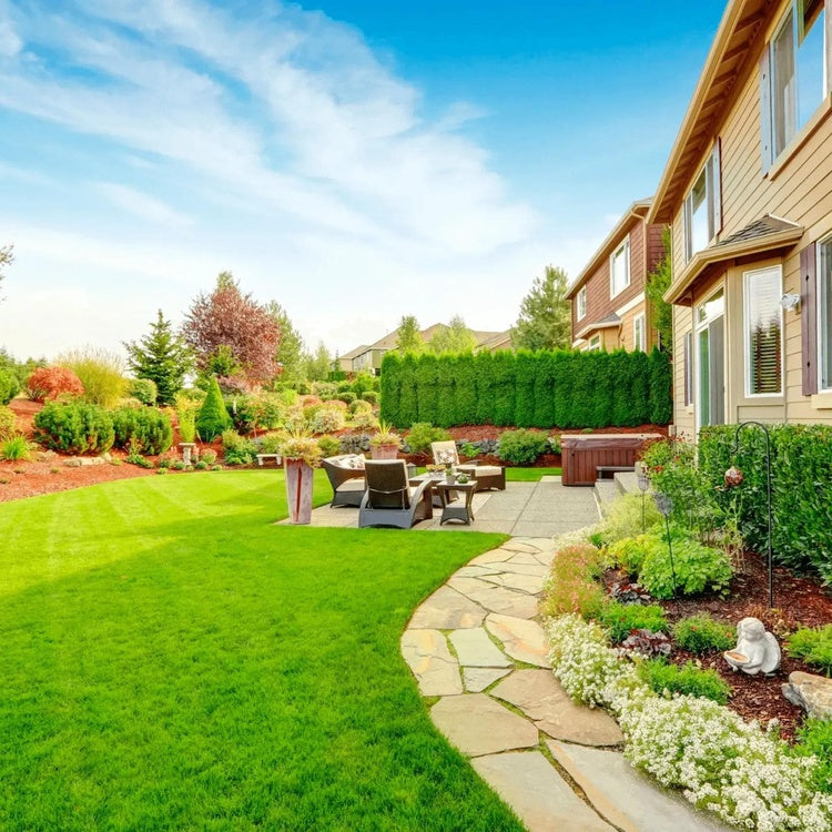 Green lawn landscape maintained with efficient garden irrigation system
